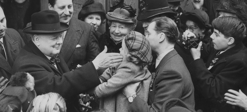 Winston Churchill leaves a polling station in 1950 (Photo by Fred Ramage/Keystone/Getty Images)